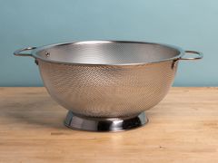 Bellemain Micro-Perforated Stainless Steel Colander displayed on a wooden table