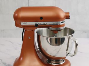 KitchenAid Artisan Series 5-Quart Tilt-Head Stand Mixer displayed on marble countertop