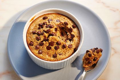 Blended Baked Oats in a ramekin with a spoon 