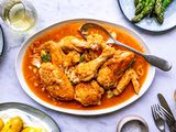 Braised chicken recipe on a serving platter