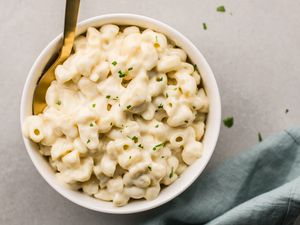 Cheesy Bechamel sauce in a bowl of mac and cheese