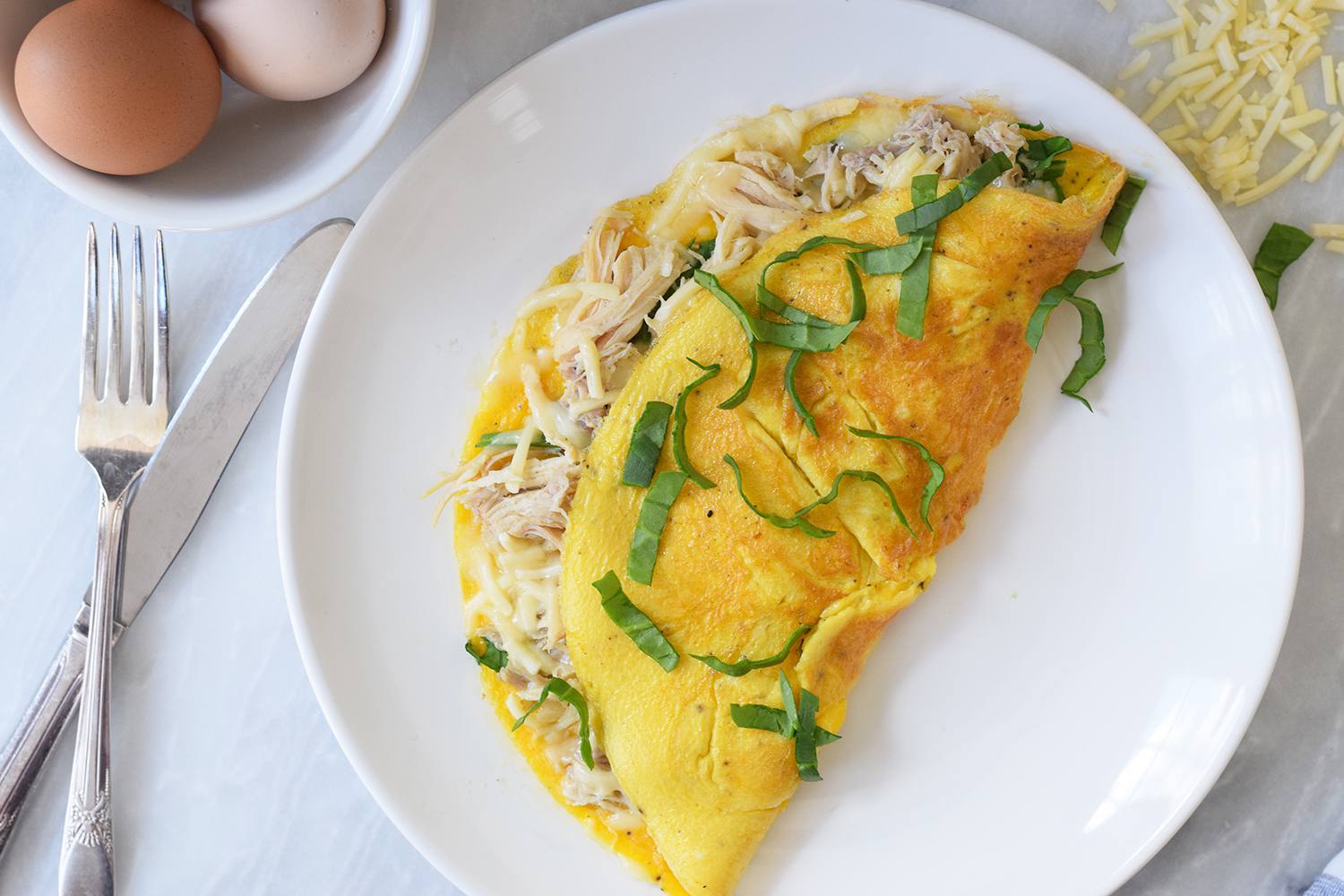 Chicken omelet on a white plate