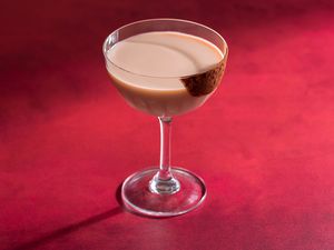 Easy Chocolate Martini in a glass with cooca powder rim