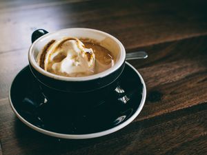 Coffee with ice cream in cup