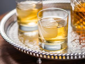 Two Highballs on a sliver platter 