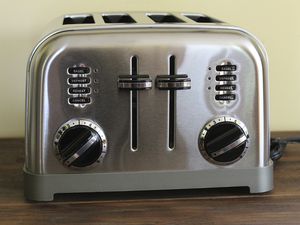 Cuisinart 4-Slice Metal Classic Toaster displayed on a wooden table