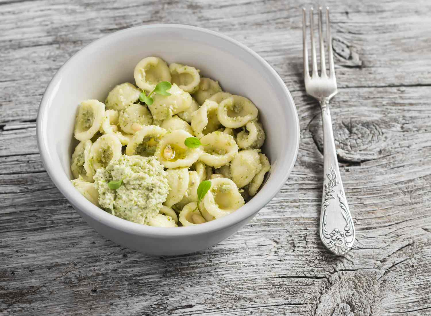 Delicious healthy vegetarian pasta with broccoli and pine nuts pesto