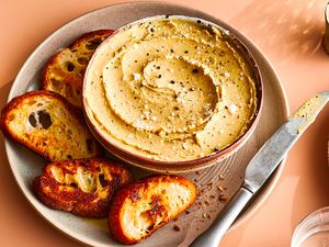 Duck Liver Pâté in a bowl, served with toast 