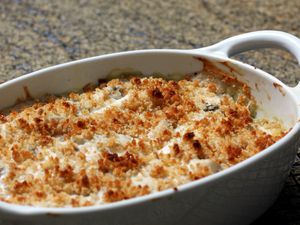 Fish Florentine in a white casserole dish