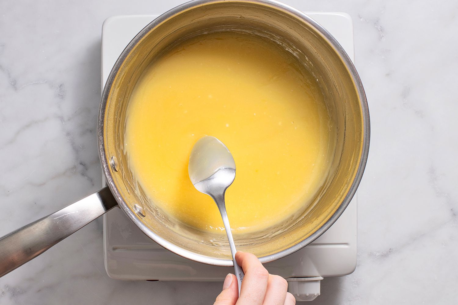 mixing pineapple mixture in a pan