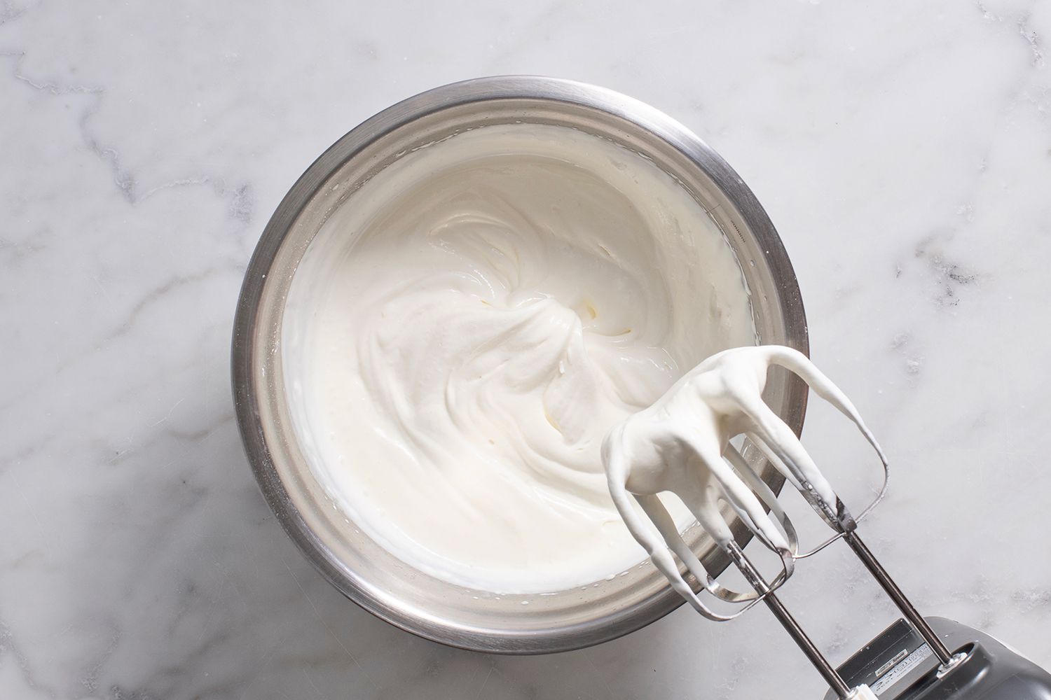 whipped cream in a steel bowl