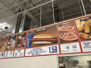 A close up of the Costco Food Court menu, featuring a hot dog. 