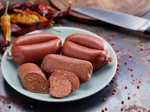 Turkish sausages sucuk (whole and slices) and spices