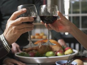 Friends toasting wine glasses