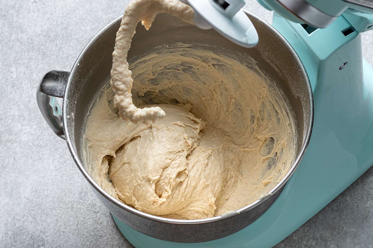 Stand mixer with dough book mixing dough