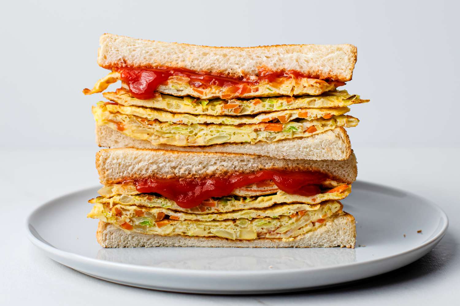 Korean Egg Sandwich on a white plate