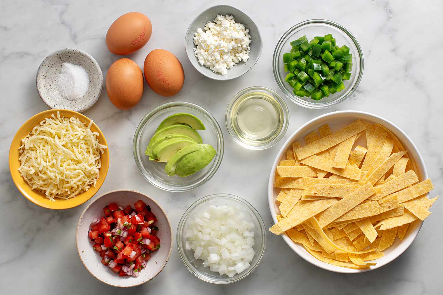 Migas ingredients in bowls 