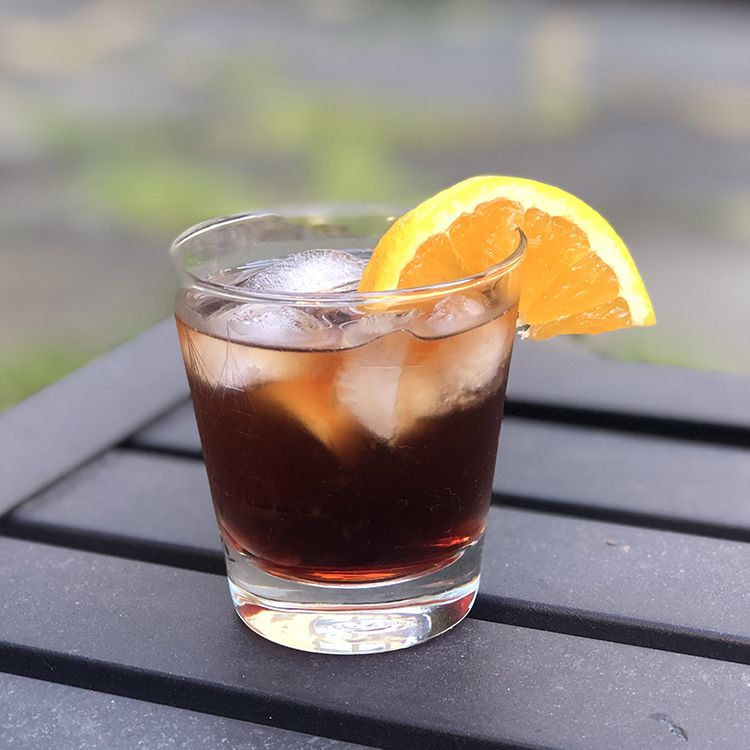 Negroni cocktail with orange slice