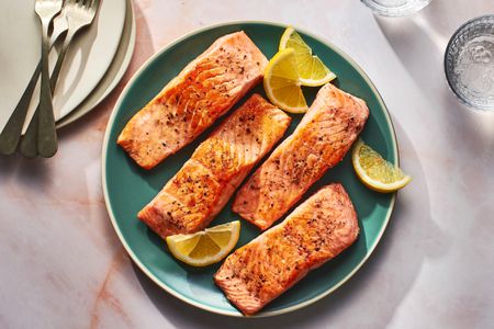 Pan-seared salmon served with lemon