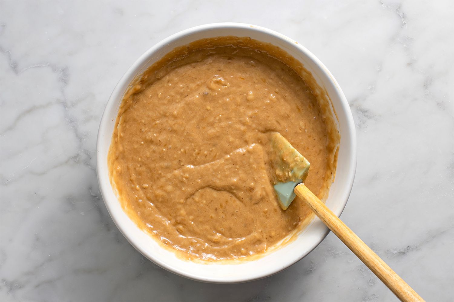 Batter in a bowl, with a spatula 