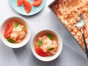 Prink grapefruit granita served in bowls. 