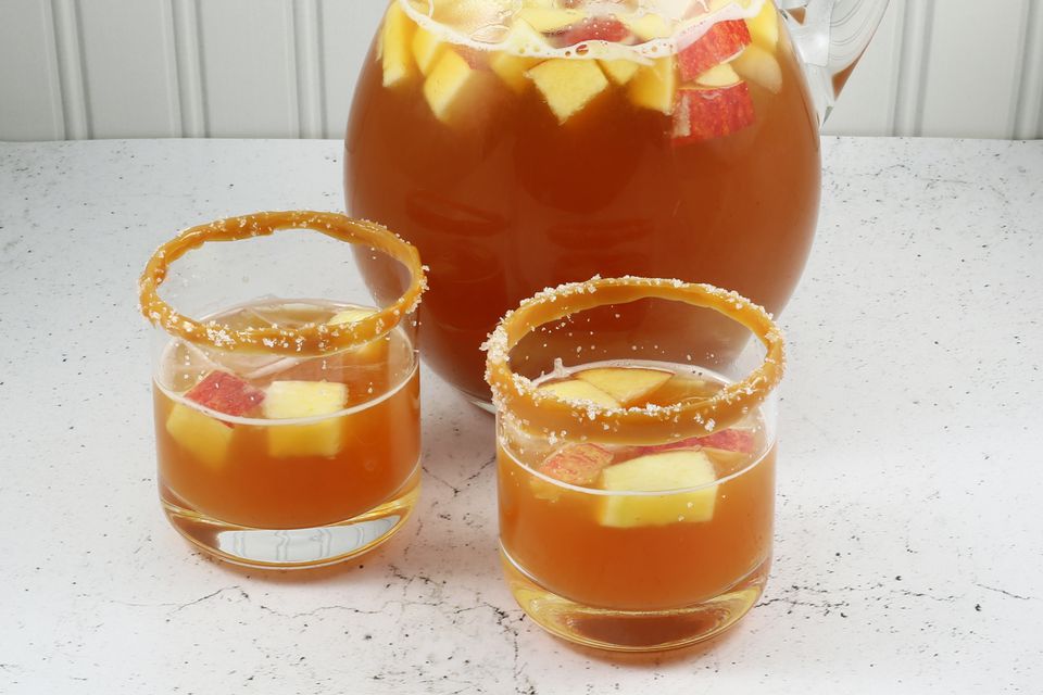 Salted Caramel Apple Punch in glasses and a punch bowl