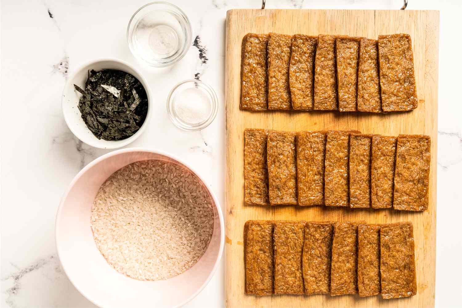 Ingredients for rice stuffed tofu pockets gathered 