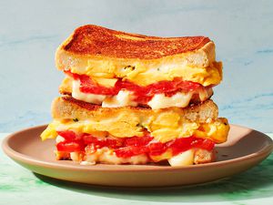 scrambled egg and tomato grilled cheese sandwich