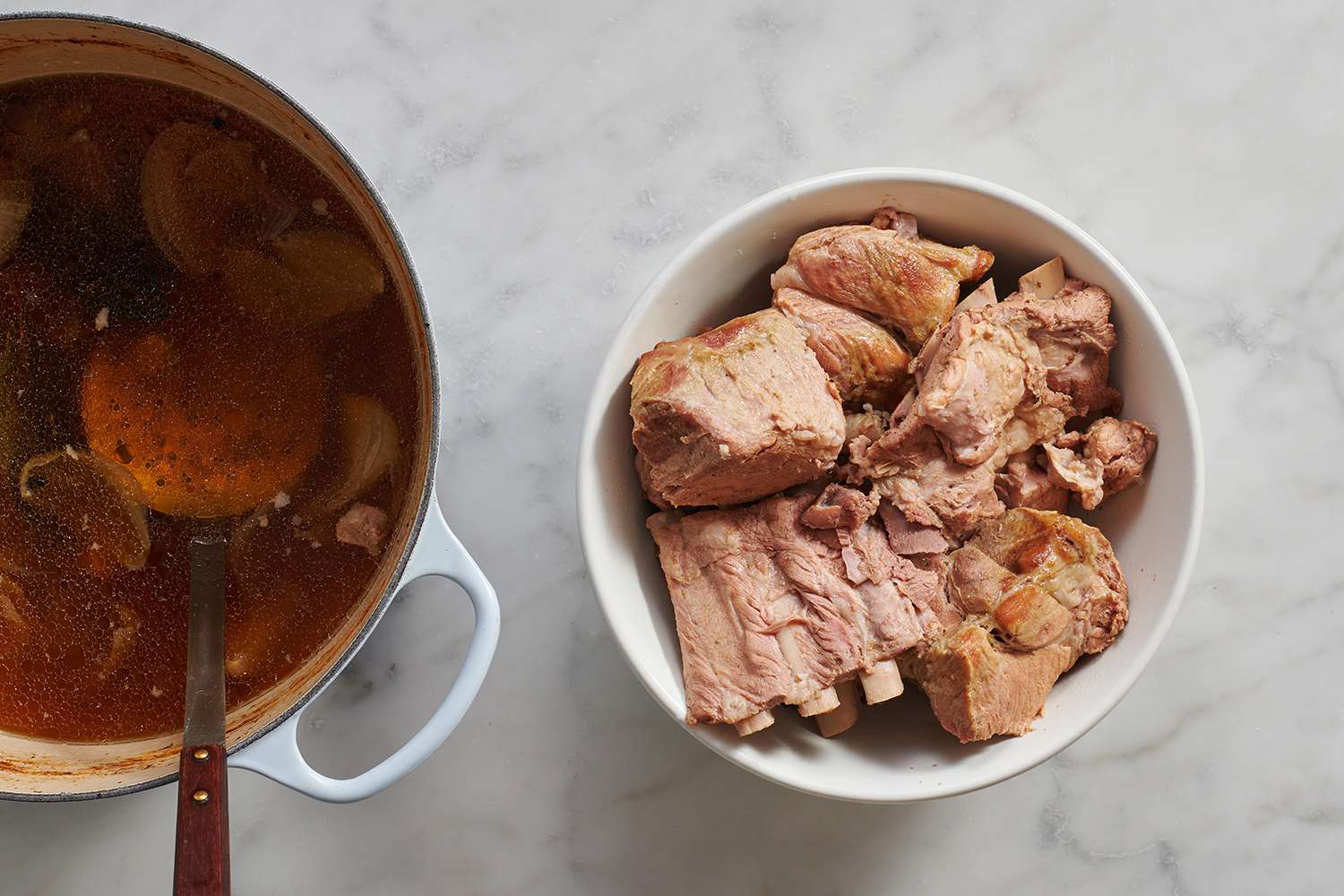 cooked pork meat and bones in a bowl