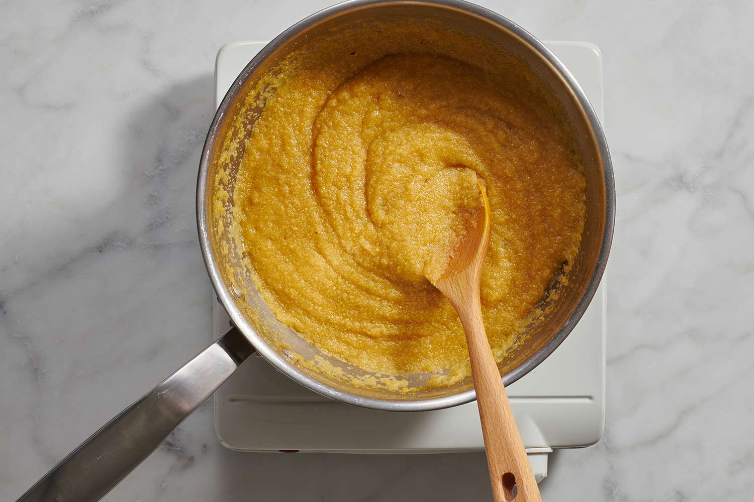 cornmeal cooking in a saucepan