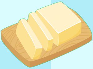 An illustration of butter on a wooden board