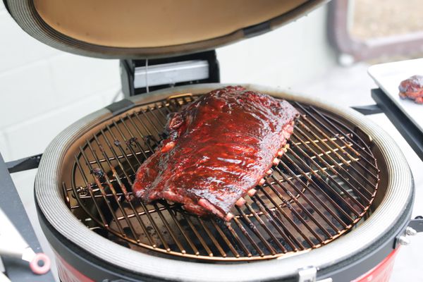 Ribs cooking on a Kamado Konnected Joe grill