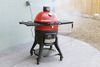 The Kamado Joe Konnected Joe 18-Inch Digital Charcoal Grill and Smoker outside on a patio