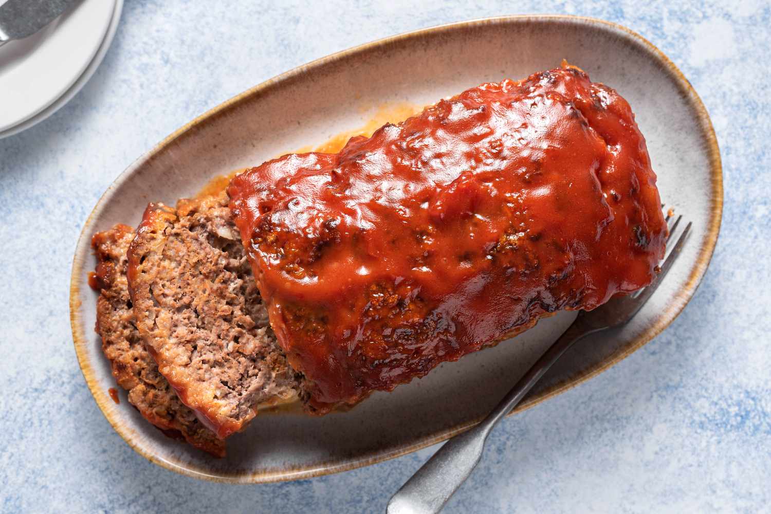 Sliced meatloaf on a plate