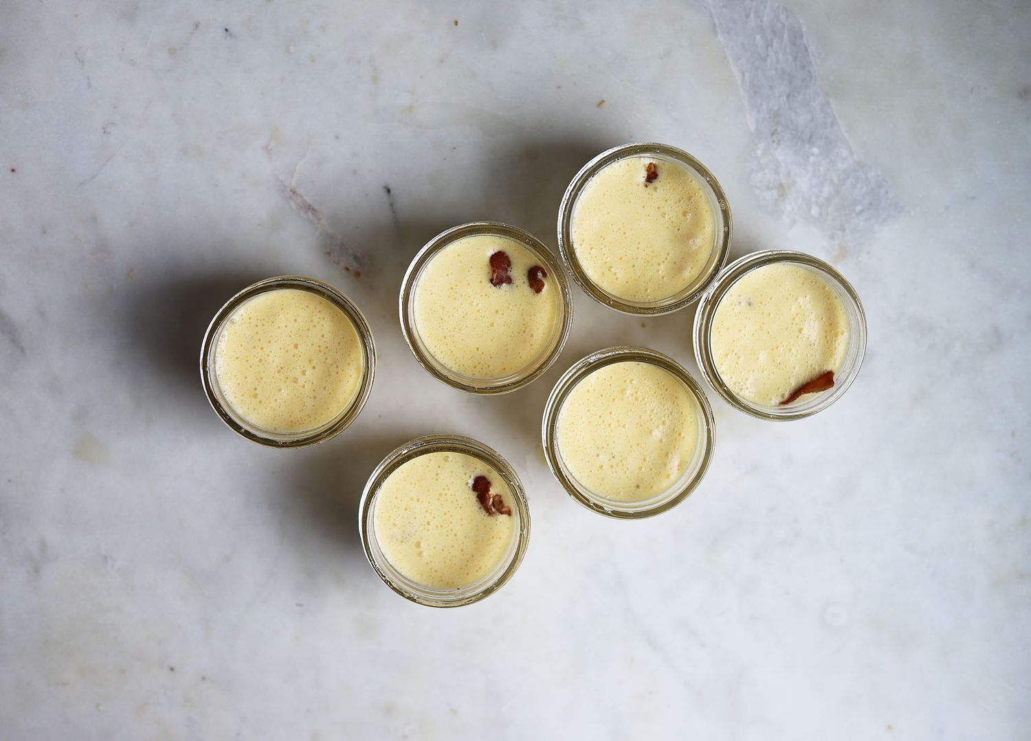 egg mixture poured into jars