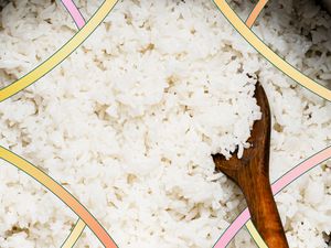 A close-up photo of a pot of rice with some graphic treatment on top. 