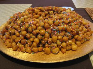 Sicilian Fried Dough Balls with Honey and Pine Nuts