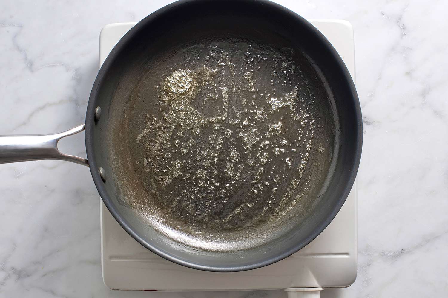 Butter melted and bubbling in a non stick skillet over.