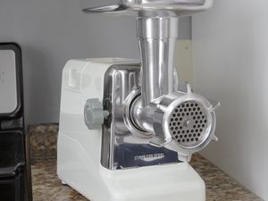 Sunmile Electric Meat Grinder displayed on a kitchen counter