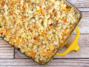 Tuna, cheese, and rice casserole in a yellow casserole dish