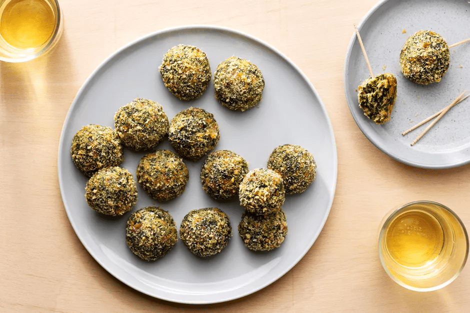 Baked Cheesy Spinach Balls on a white plate