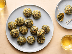 Baked Cheesy Spinach Balls on a white plate